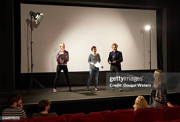 theatre group rehearsing on stage. - actor chair stock pictures, royalty-free photos & images