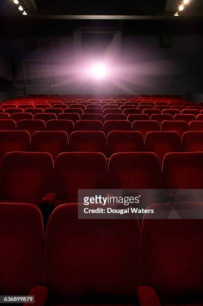 empty seats in movie theatre. - cinema seats ストックフォトと画像