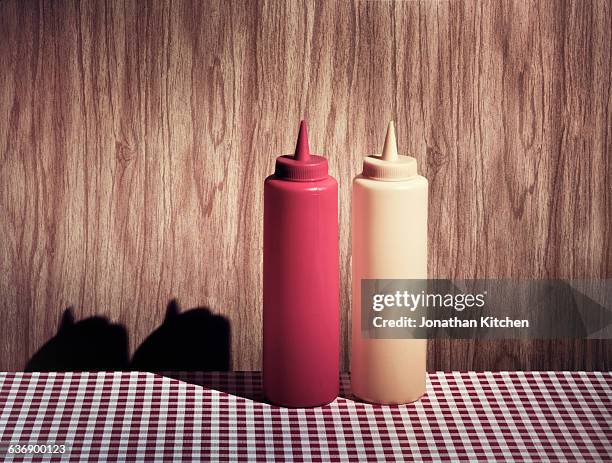 cafe scene of ketchup and mustard - food dressing stock pictures, royalty-free photos & images