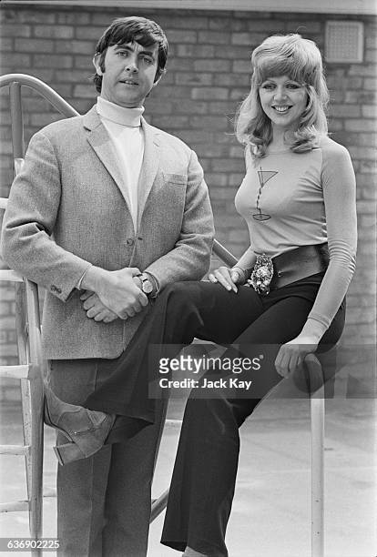 English actors Carol Hawkins and John Alderton in a publicity still for the television series 'Please Sir', UK, 5th May 1971.
