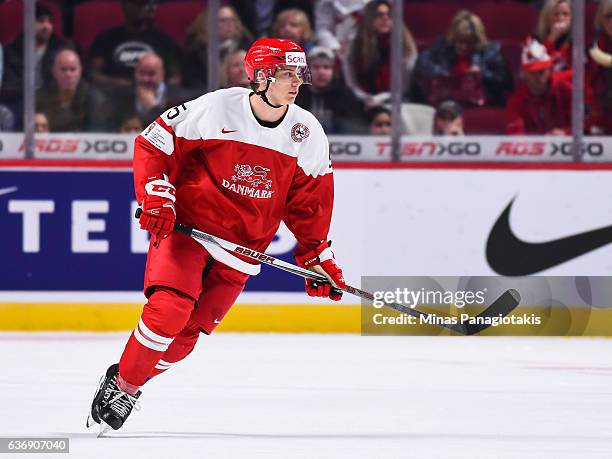 Oliver Gatz Nielsen of Team Denmark skates during the IIHF World Junior Championship preliminary round game against Team Sweden at the Bell Centre on...