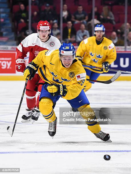 Tim Soderlund of Team Sweden skates after the puck during the IIHF World Junior Championship preliminary round game against Team Denmark at the Bell...