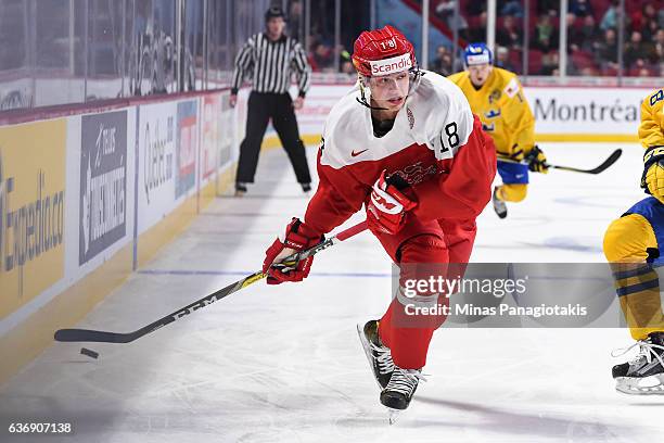 William Boysen of Team Denmark skates the puck during the IIHF World Junior Championship preliminary round game against Team Sweden at the Bell...