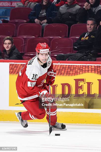 Rasmus Andersson of Team Denmark skates the puck during the IIHF World Junior Championship preliminary round game against Team Sweden at the Bell...