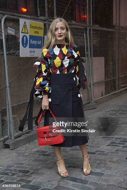 Fashion stylist Kate Foley wears a J W Anderson bag on day 2 of London Womens Fashion Week Spring/Summer 2016, on September 17, 2016 in London,...