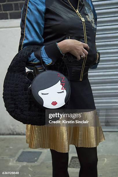 Designer and fashion model Jasmine Guinness wears a Lulu Guinness bag on day 2 of London Womens Fashion Week Spring/Summer 2016, on September 17,...