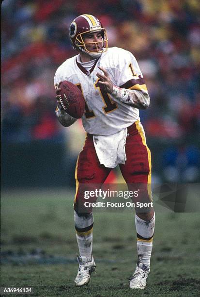 Mark Rypien of the Washington Redskins drops back to pass against the San Francisco 49ers during the NFC Divisional Playoffs January 9, 1993 at...