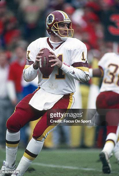Mark Rypien of the Washington Redskins drops back to pass against the San Francisco 49ers during the NFC Divisional Playoffs January 9, 1993 at...