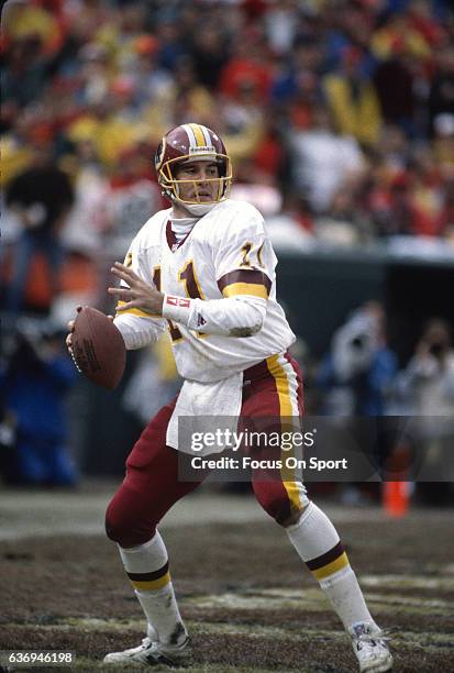 Mark Rypien of the Washington Redskins drops back to pass against the San Francisco 49ers during the NFC Divisional Playoffs January 9, 1993 at...