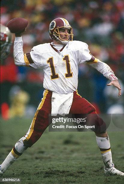 Mark Rypien of the Washington Redskins drops back to pass against the San Francisco 49ers during the NFC Divisional Playoffs January 9, 1993 at...