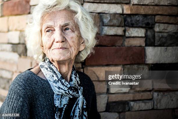 senior woman lost in thoughts - 85 2016 stock pictures, royalty-free photos & images