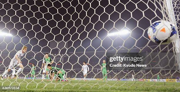 China - Naoki Ishihara of Sanfrecce Hiroshima scores the first of his two goals to help the Japanese soccer club come from behind and draw 2-2 with...