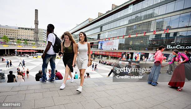 crowd on square sergels torg - beggar stock pictures, royalty-free photos & images