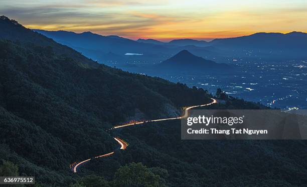 lighting road along ngoan muc pass, ninh thuan, vietnam - dalat stock pictures, royalty-free photos & images