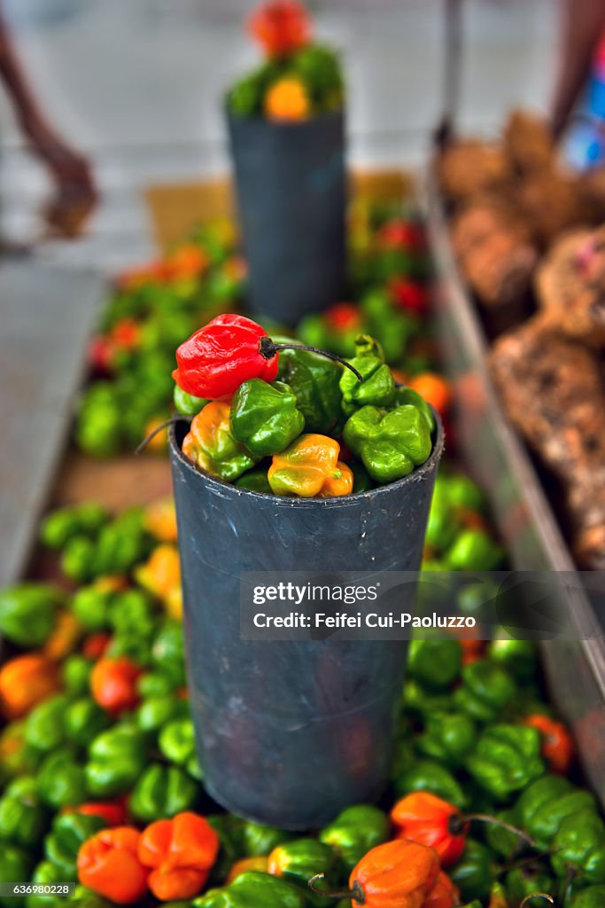 Street vendor selling Caribbean peppers at Cienfuegos town in Cuba