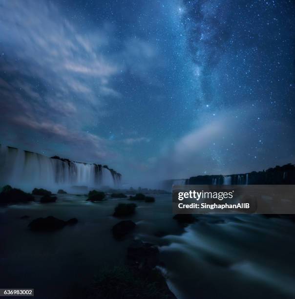 iguazu waterfalls in brazil with the stars and milky way at night - brasil global tour brazil v argentina stock pictures, royalty-free photos & images