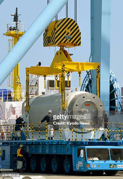 Rokkasho, Japan - Highly radioactive waste is unloaded from a vessel at Mutsu Ogawara port in Rokkasho, Aomori Prefecture, northeastern Japan, for...