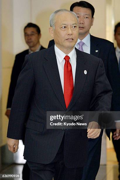 Japan - Tokyo Gov. Yoichi Masuzoe is seen at Tokyo's Haneda airport before departing for Beijing on April 24, 2014.