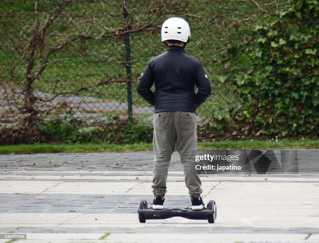 Child having fun with an Two-wheel electric skate