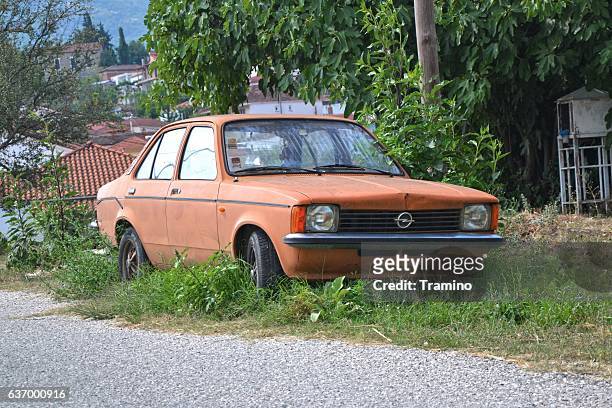 opel kadett dying on the street - opel stock pictures, royalty-free photos & images