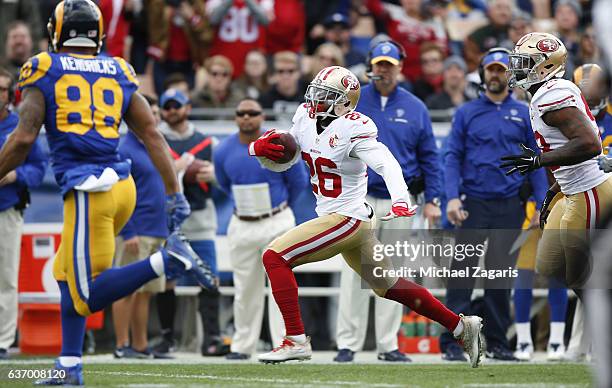 Tramaine Brock of the San Francisco 49ers returns an interception during the game against the Los Angeles Rams at the Los Angeles Coliseum on...