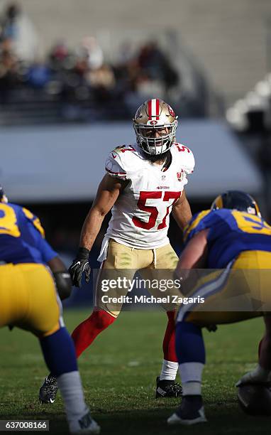 Michael Wilhoite of the San Francisco 49ers defends during the game against the Los Angeles Rams at the Los Angeles Coliseum on December 24, 2016 in...