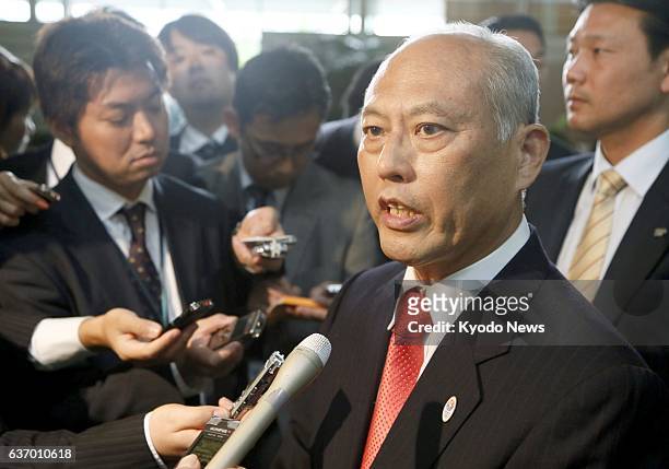 Japan - Tokyo Gov. Yoichi Masuzoe answers a reporter's question after meeting with Prime Minister Shinzo Abe at the premier's office in Tokyo on...