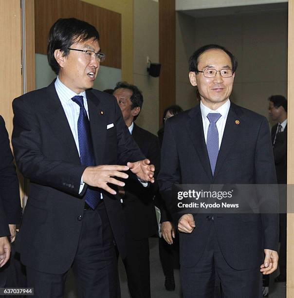 South Korea - Japanese Environment Minister Nobuteru Ishihara and South Korean Environment Minister Yoon Seong Kyu leave after meeting in Daegu,...