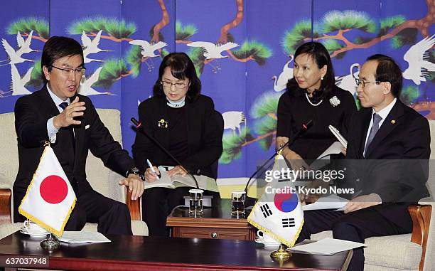 South Korea - Japanese Environment Minister Nobuteru Ishihara and South Korean Environment Minister Yoon Seong Kyu meet in Daegu, South Korea, on...