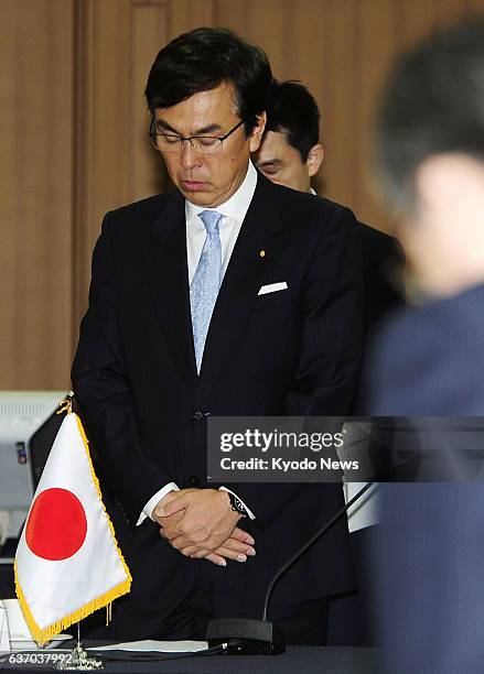 South Korea - Japanese Environment Minister Nobuteru Ishihara offers silent prayers for the victims of South Korea's sunken ferry Sewol at the start...