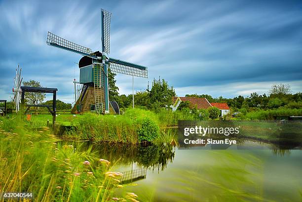 old windmill in the village of tienhoven, netherlands. - utrecht stock pictures, royalty-free photos & images