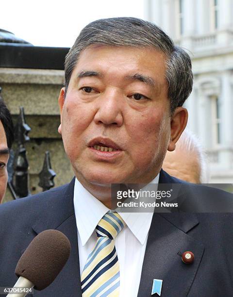 United States - Shigeru Ishiba, secretary general of Japan's ruling Liberal Democratic Party, speaks with reporters in front of the White House in...