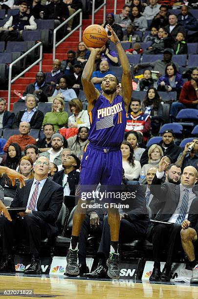 Brandon Knight of the Phoenix Suns shoots the ball against the Washington Wizards at Verizon Center on November 21, 2016 in Washington, DC. NOTE TO...