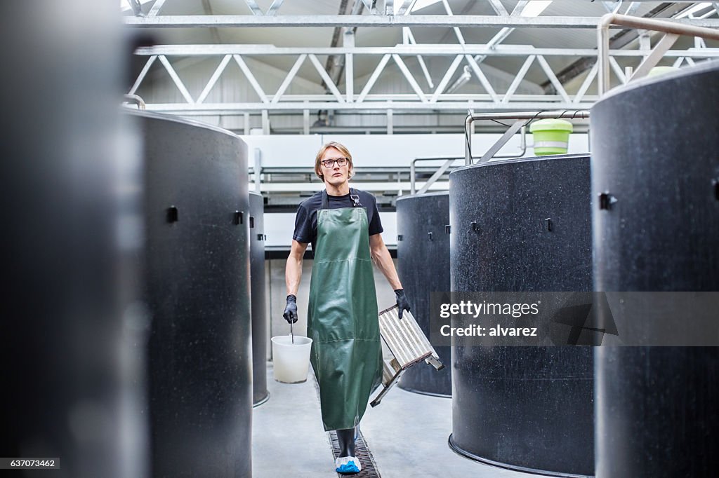 Man working in fish farm