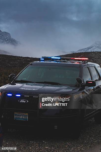 mount charleston winter storm police road block - highway patrol stock pictures, royalty-free photos & images