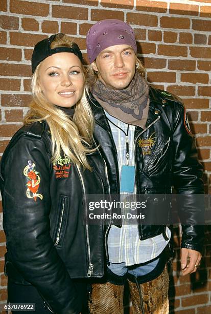 Canadian-American actress and model Pamela Anderson and American singer-songwriter and musician Bret Michaels arrive before the "Love Ride 11" To...