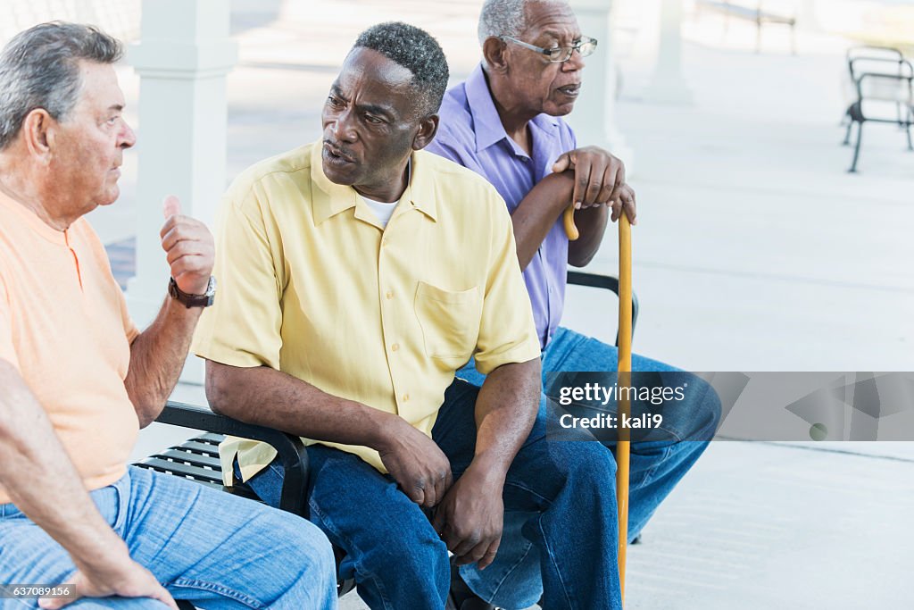 Senor Mem Multiethnic Senior Men On Park Bench Talking High-Res Stock Photo ...