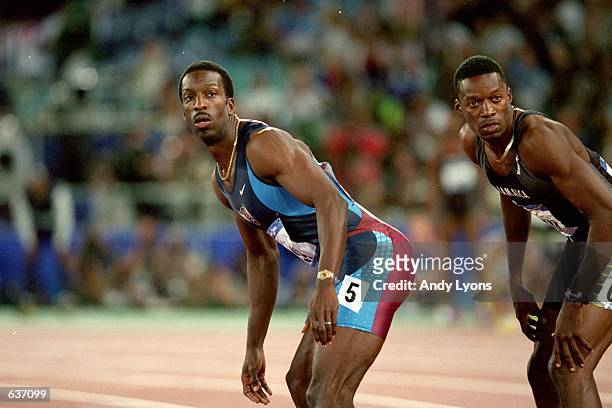 Michael Johnson of the USA gets ready for the batton to win the Gold Medal in the Mens 4x400m Final Event during the 2000 Sydney Olympic Games at the...