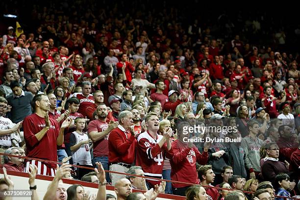 Fans cheer during the game between the Indiana Hoosiers and the Nebraska Cornhuskers at Assembly Hall on December 28, 2016 in Bloomington, Indiana.