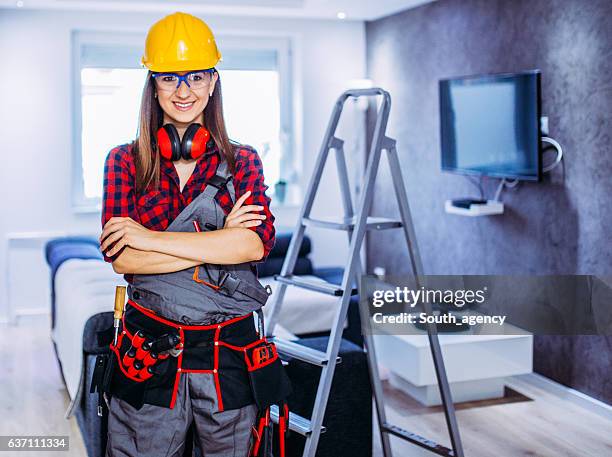 beautiful construction worker - tool belt stock pictures, royalty-free photos & images