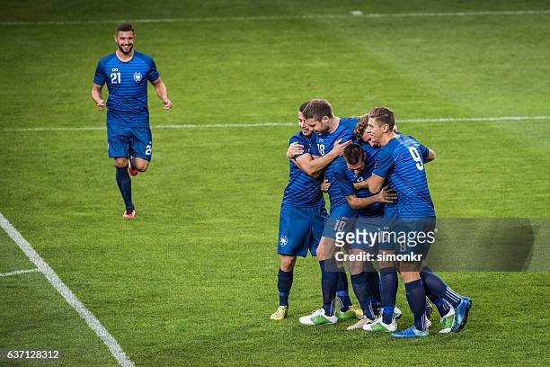 football players celebrating - soccer team stock pictures, royalty-free photos & images
