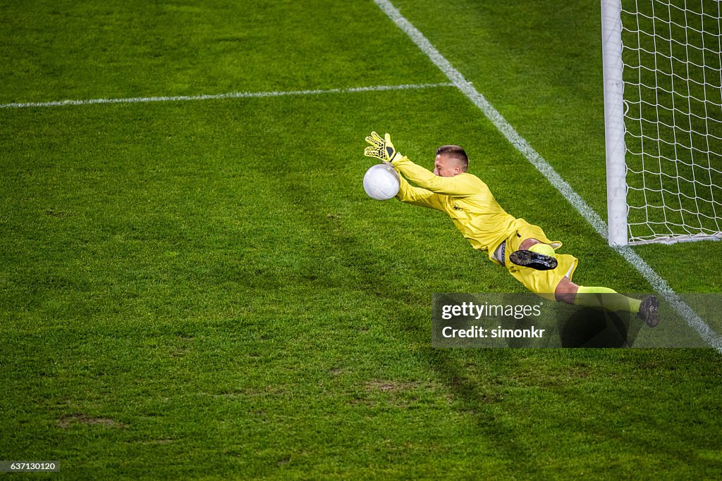 Goalkeeper diving