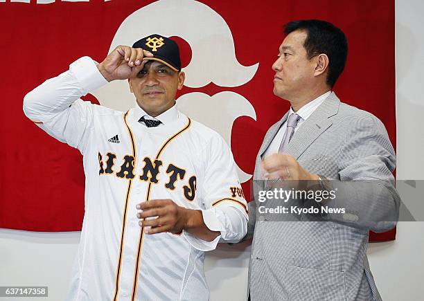Japan - Cuban outfielder Frederich Cepeda and Yomiuri Giants manager Tatsunori Hara attend a press conference introducing Cepeda on May 12 in Tokyo.