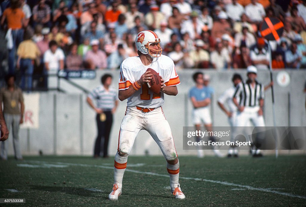 Steve Spurrier of the Tampa Bay Buccaneers drops back to pass against