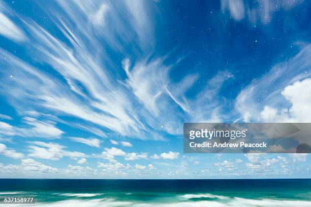 cirrus clouds under moonlight - 巻雲 ストックフォトと画像