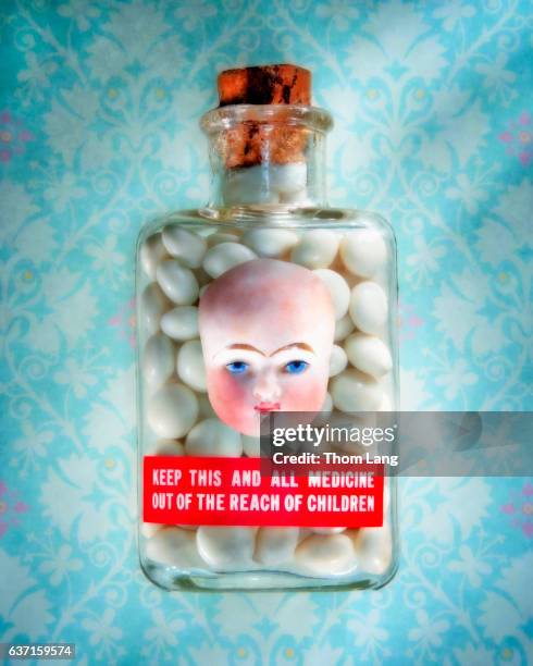 pill bottle with doll face - generic safety sign stock pictures, royalty-free photos & images