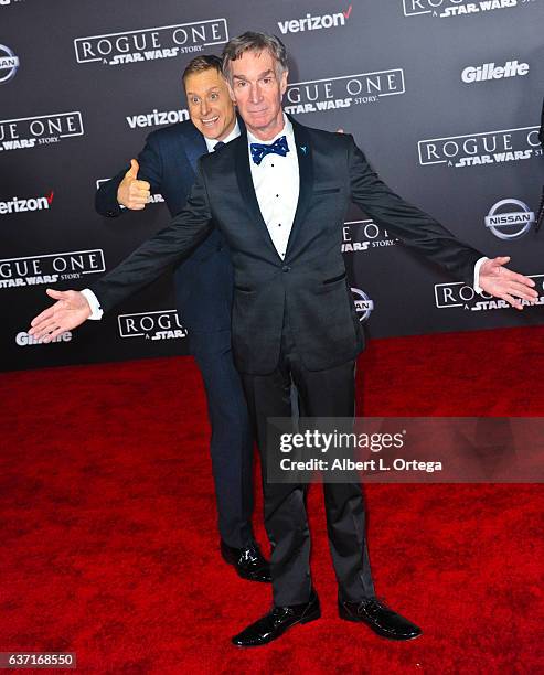 Actor Alan Tudyk photobombs Bill Nye The Science Guy at the Premiere Of Walt Disney Pictures And Lucasfilm's "Rogue One: A Star Wars Story" held at...