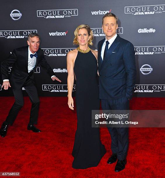 Actress Charissa Barton and actor Alan Tudyk about to be photo bombed by Bill Nye the Science Guy at the Premiere Of Walt Disney Pictures And...