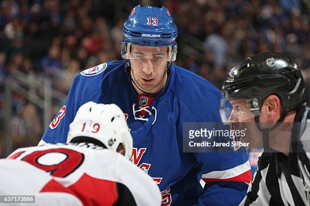 Kevin Hayes of the New York Rangers looks on during a face-off against Derick Brassard of the Ottawa Senators at Madison Square Garden on December...