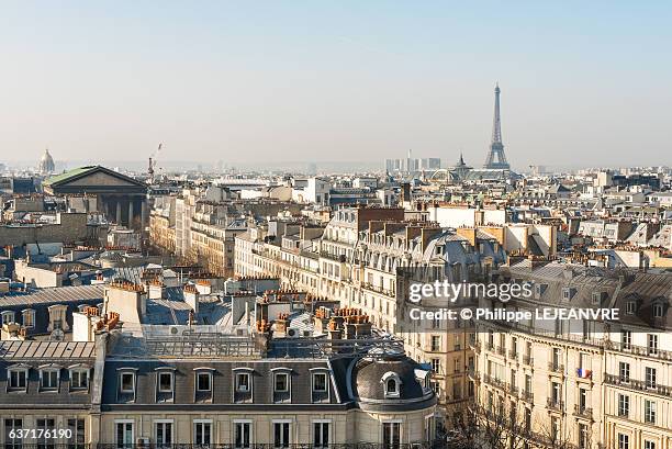 paris skyline with eiffel tower aerial view in daylight - paris skyline fotografías e imágenes de stock